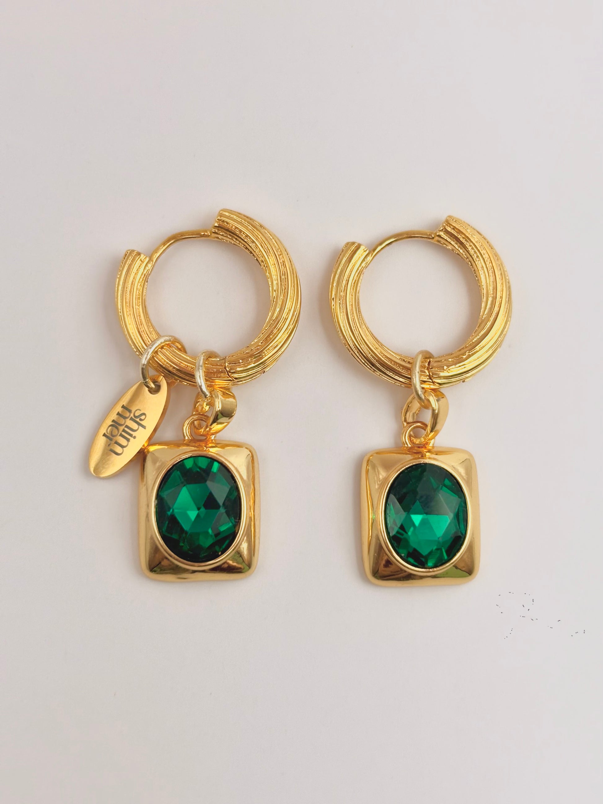 Oval Emerald golden hoop earrings