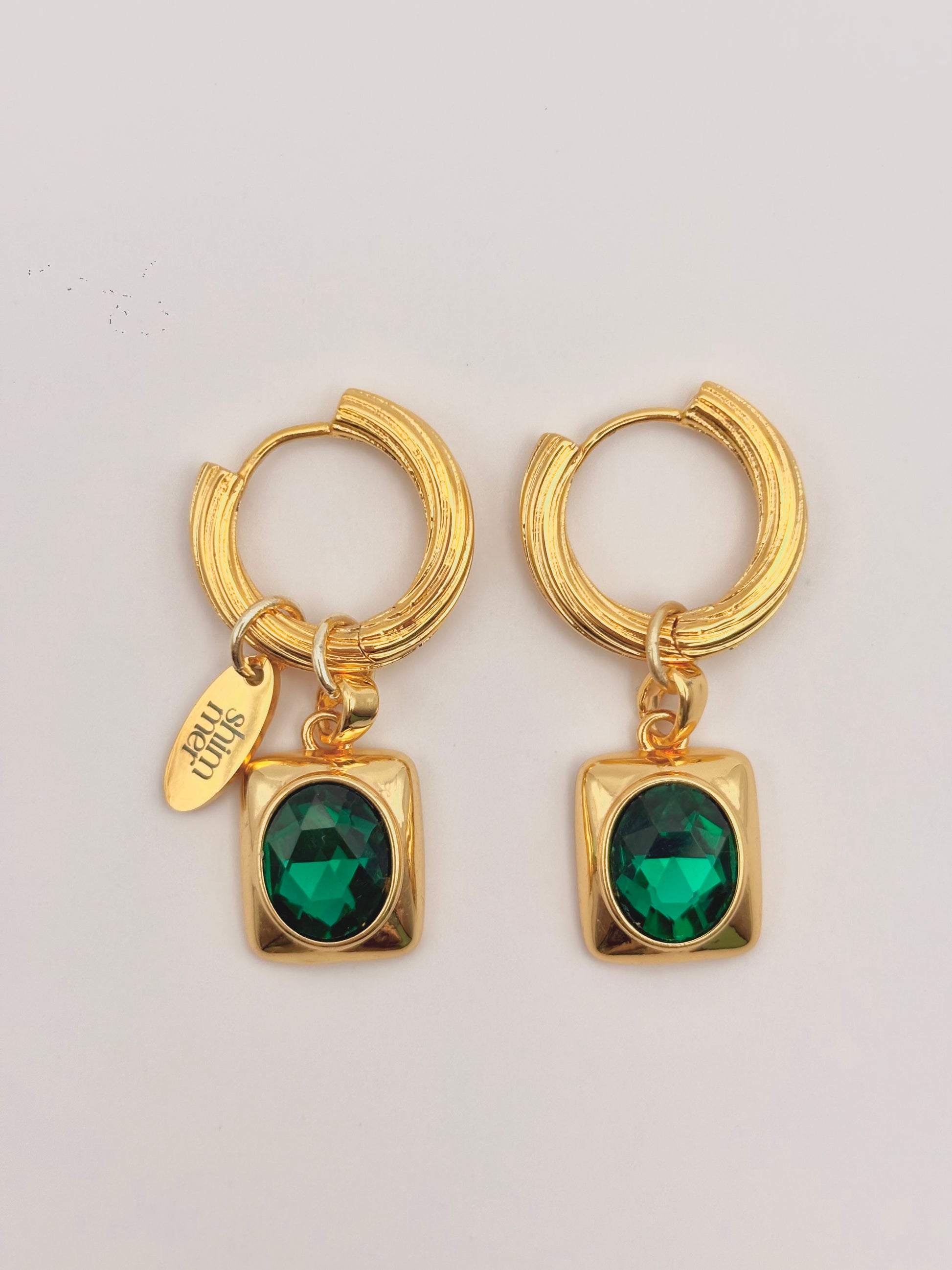 Oval Emerald golden hoop earrings