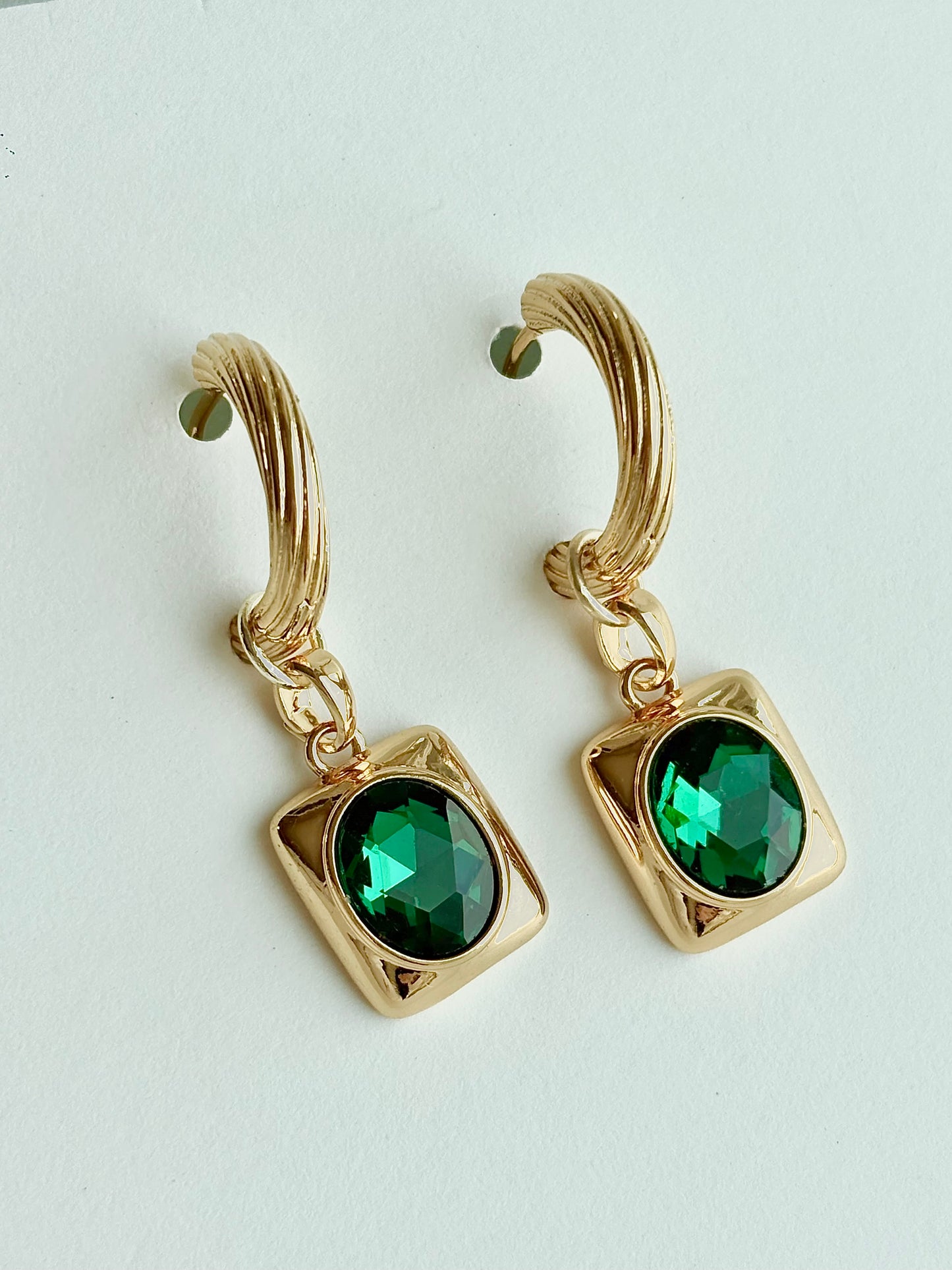 Oval Emerald golden hoop earrings