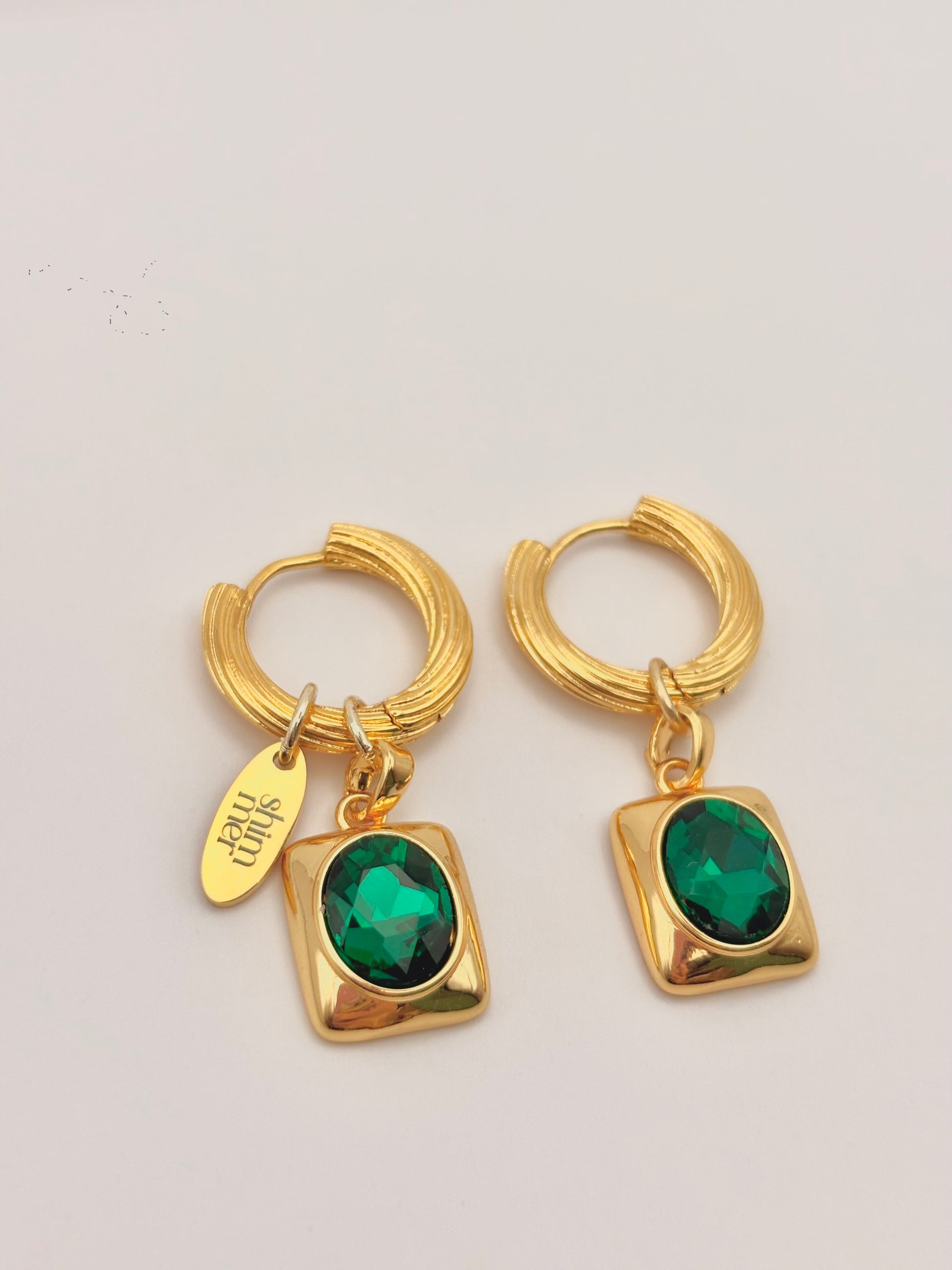 Oval Emerald golden hoop earrings